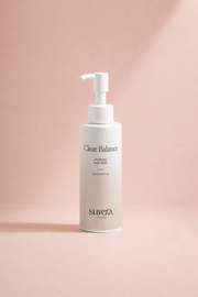 Suvera Clear Balance purifying face wash in minimal luxury skincare packaging on soft blush pink background