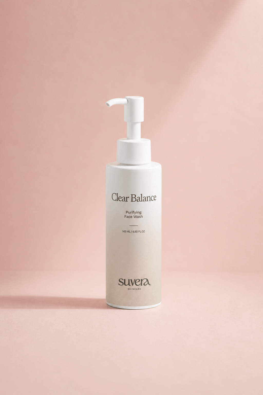 Suvera Clear Balance purifying face wash in minimal luxury skincare packaging on soft blush pink background
