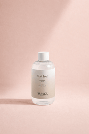 Suvera Soft Peel bottle on a pink background Suvera Skincare, vegan self-care