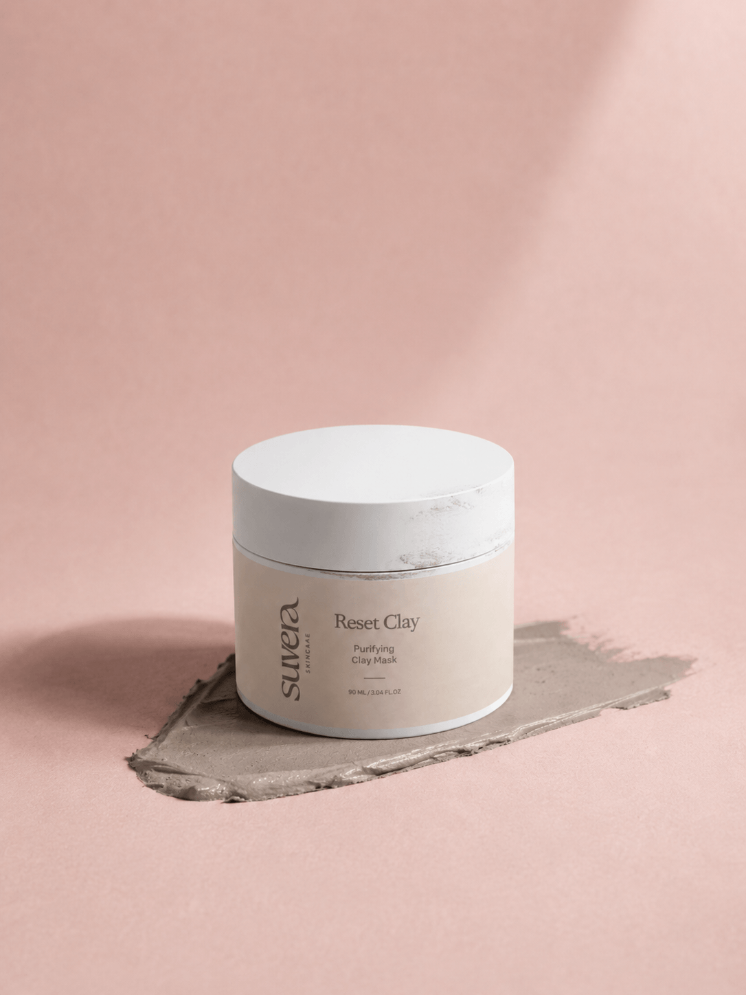 Sculpt Reset Clay jar on a pink background Suvera Skincare, natural vegan skincare, skincare rituals