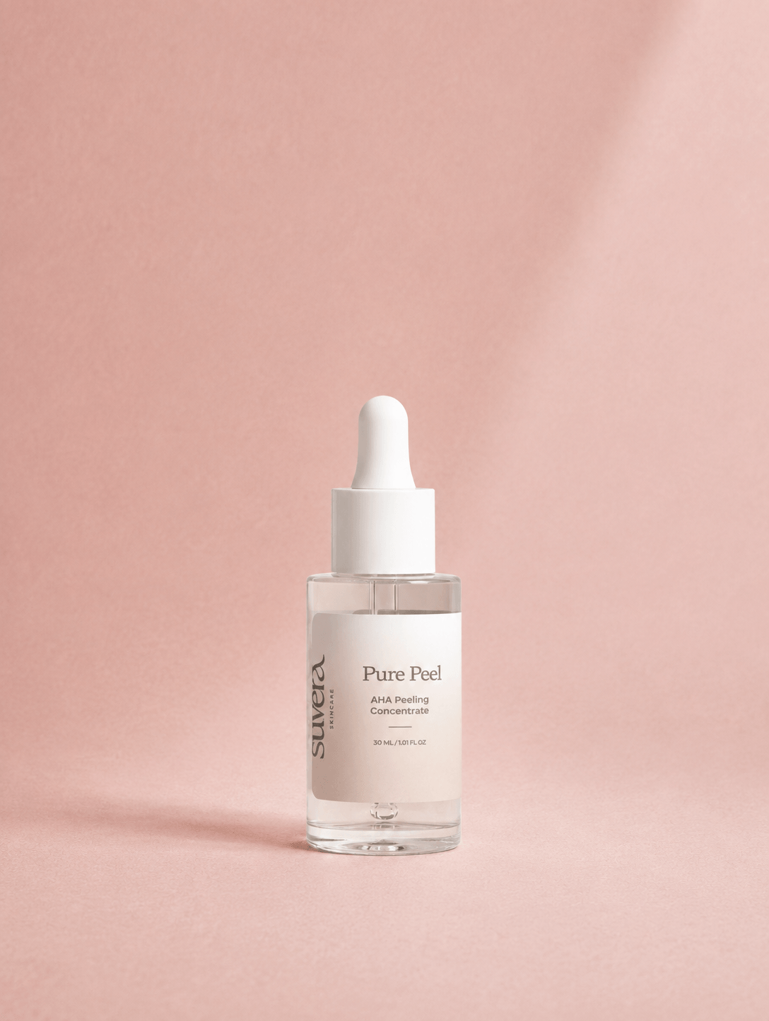 Skincare serum bottle labeled 'Pure Peel' on a light gray background Suvera Skincare, skincare rituals, vegan skincare