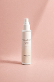 Suvera Calm Mist bottle on a pink background Suvera Skincare, COSMOS certified, skincare rituals