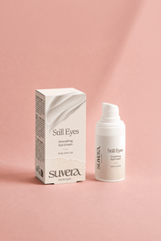 Suvera 'Still Eyes' eye cream packaging on a pink background Suvera Skincare, vegan skincare, nut-free skincare