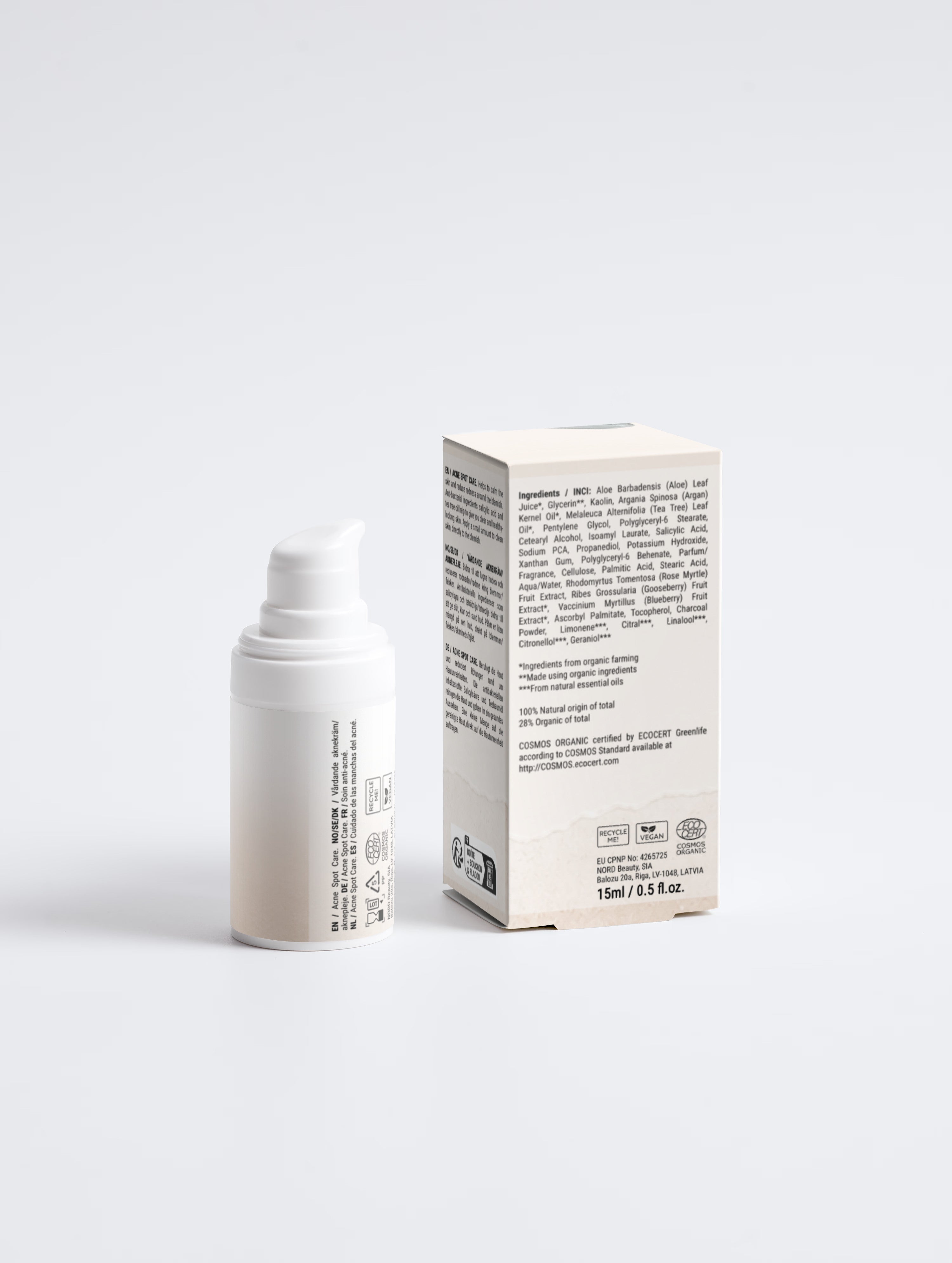 A white pump bottle and its matching beige product box, both printed with black text, photographed on a clean light gray studio background.