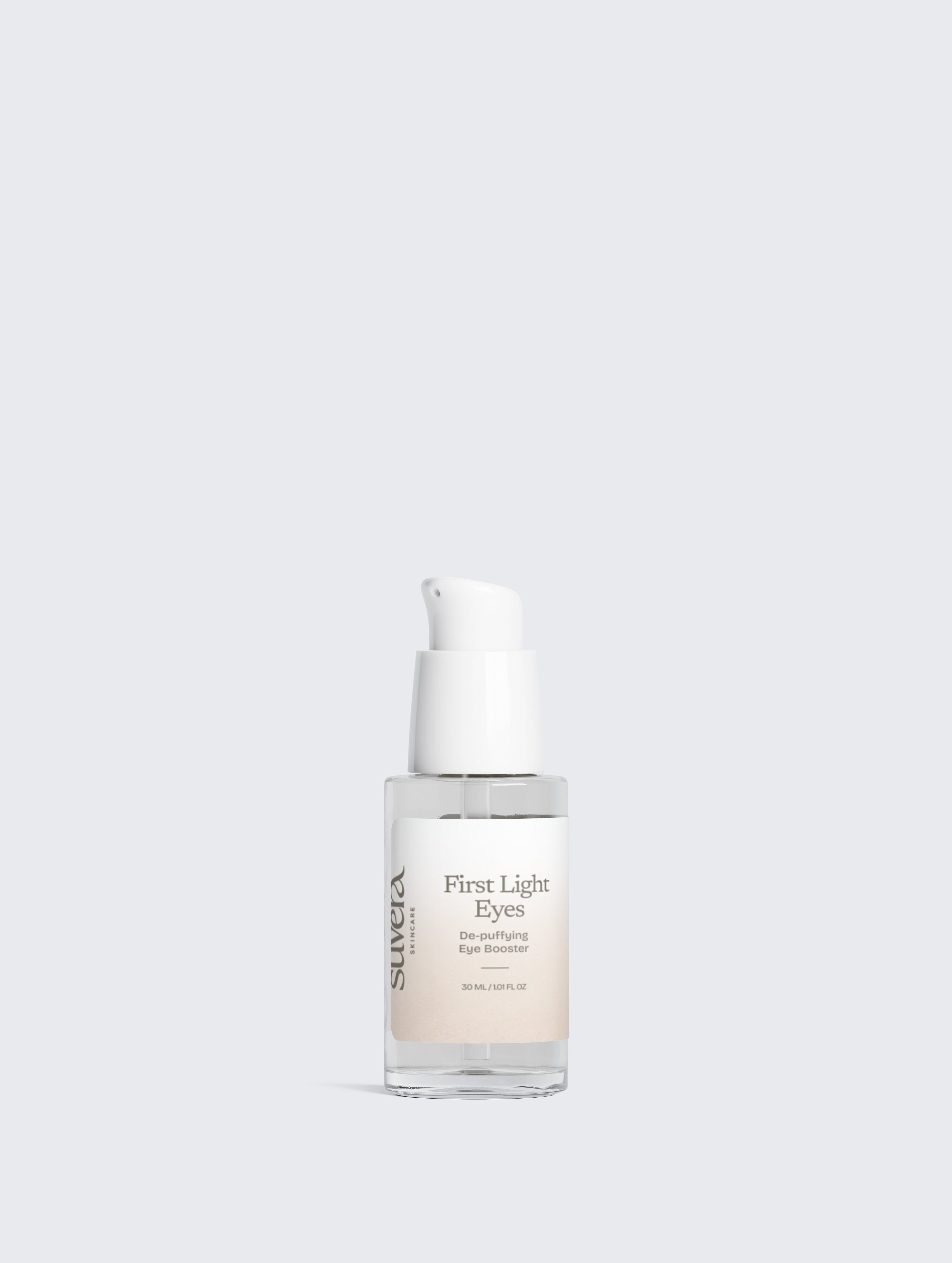 Skincare serum bottle labeled 'First Light Eyes' on a light gray background Suvera Skincare, modern skincare