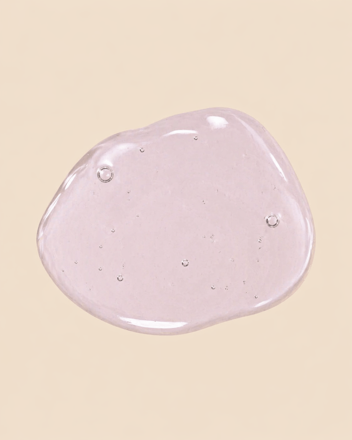 Pink gel-like substance on a beige background Suvera Skincare, blemish-prone skin care, anti-acne skincare, gentle skincare