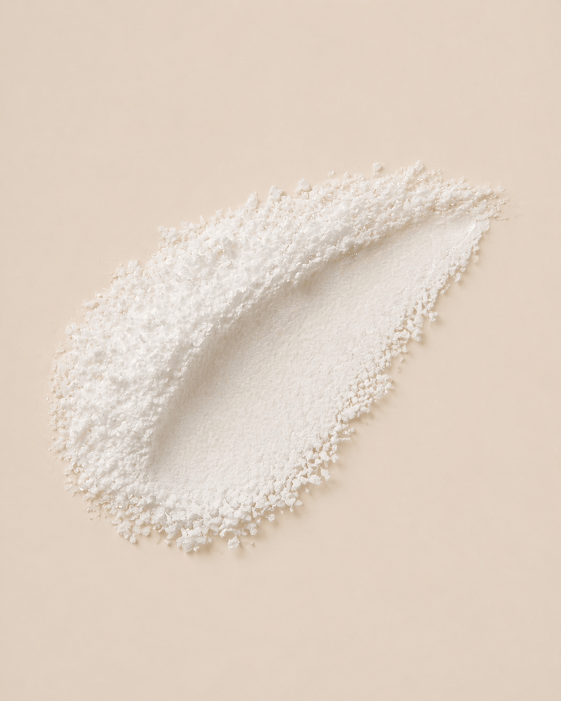White powder on a beige background